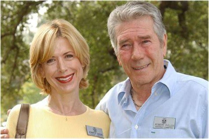 Robert Fuller and his wife at the benefit dinner to salute Chuck Norris