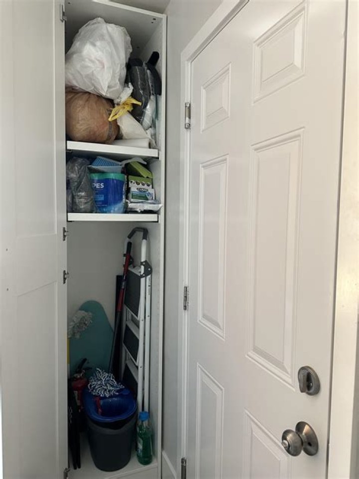 Where do you keep a mop and broom?